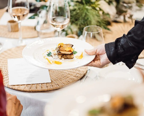 A plate with a gourmet meal served at Silka Hotel