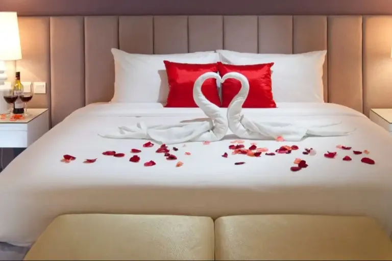 Rose petal decor and bed setup at Silka Cheras Suite