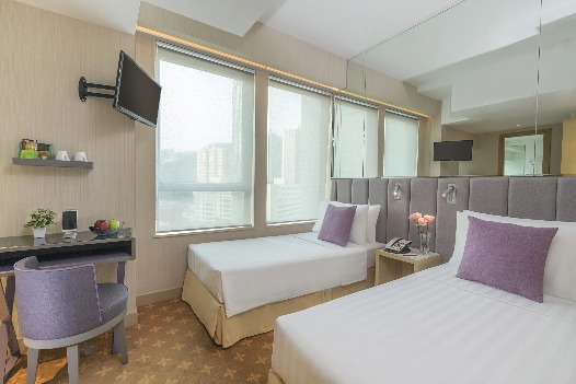 Silka Far East window-facing Deluxe Room with beds and workstation