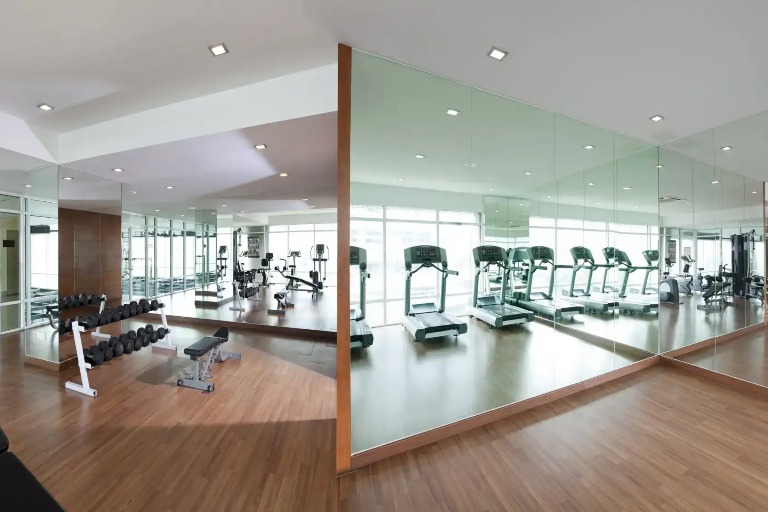 Well-equipped interior at Silka Maytower Hotel gym