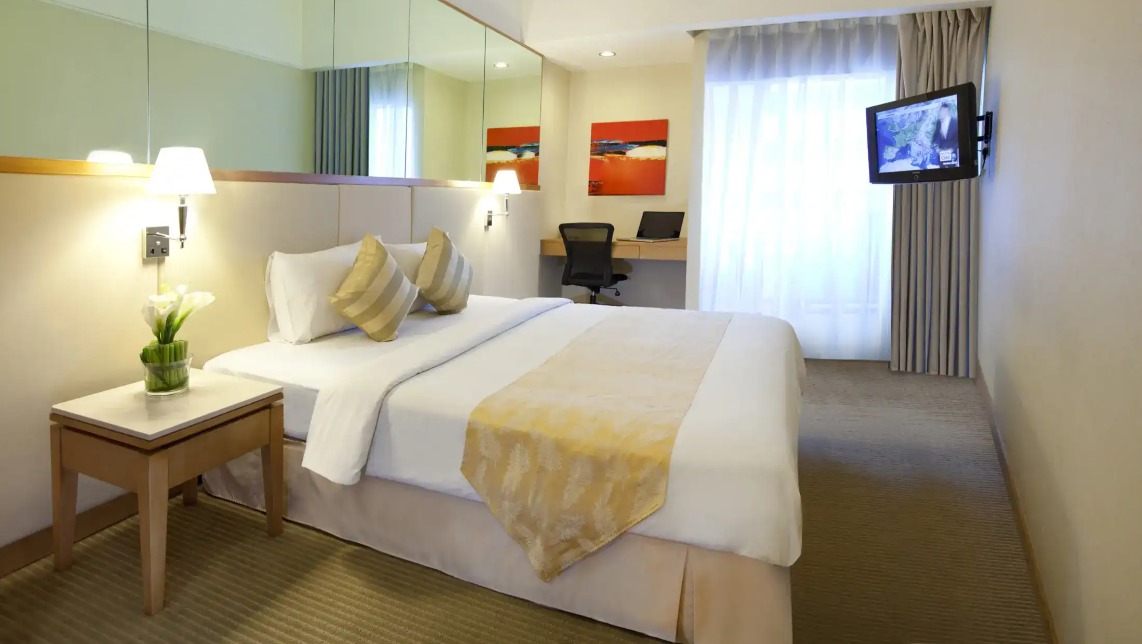 Beds and furnishings at Silka Maytower Standard Room