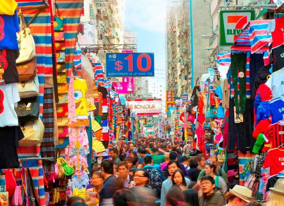 People shopping at Ladies’ Market in Hong Kong