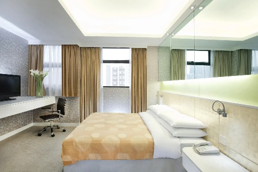 Queen-size bed and amenities at Silka Sea View Superior Suite