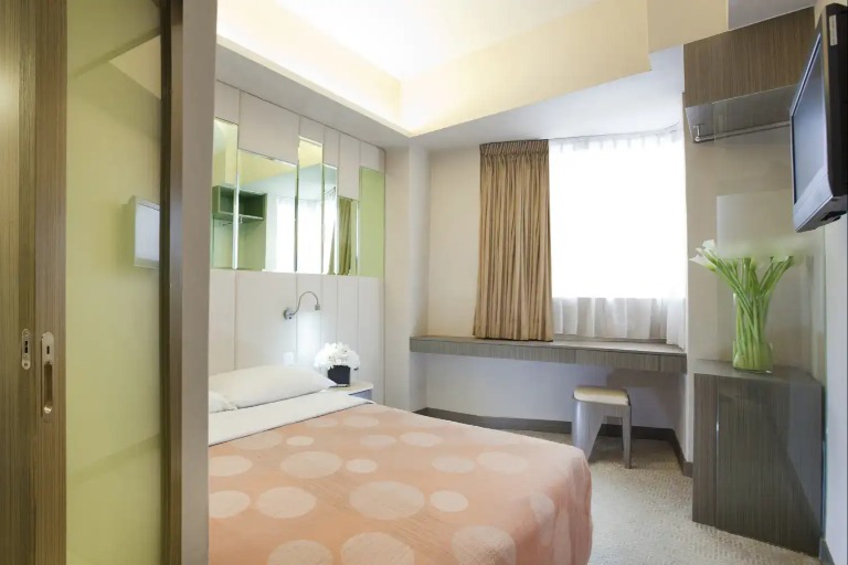 Double bed with ensuite bathroom at Silka Sea View Deluxe Room