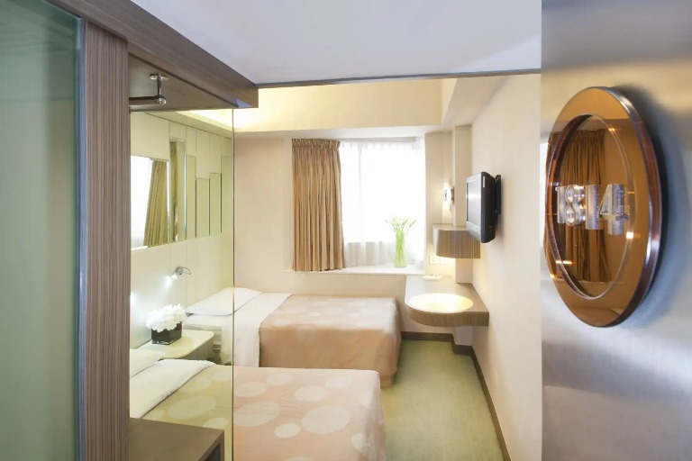 Double bed with ensuite bathroom at Silka Sea View Deluxe Room