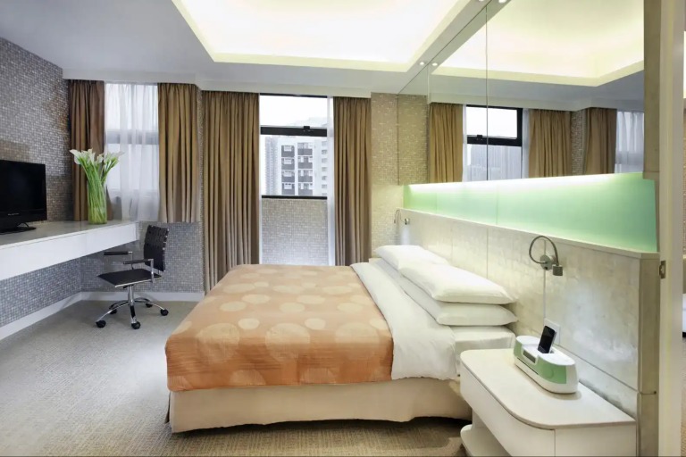 Queen-size bed and amenities at Silka Sea View Superior Suite