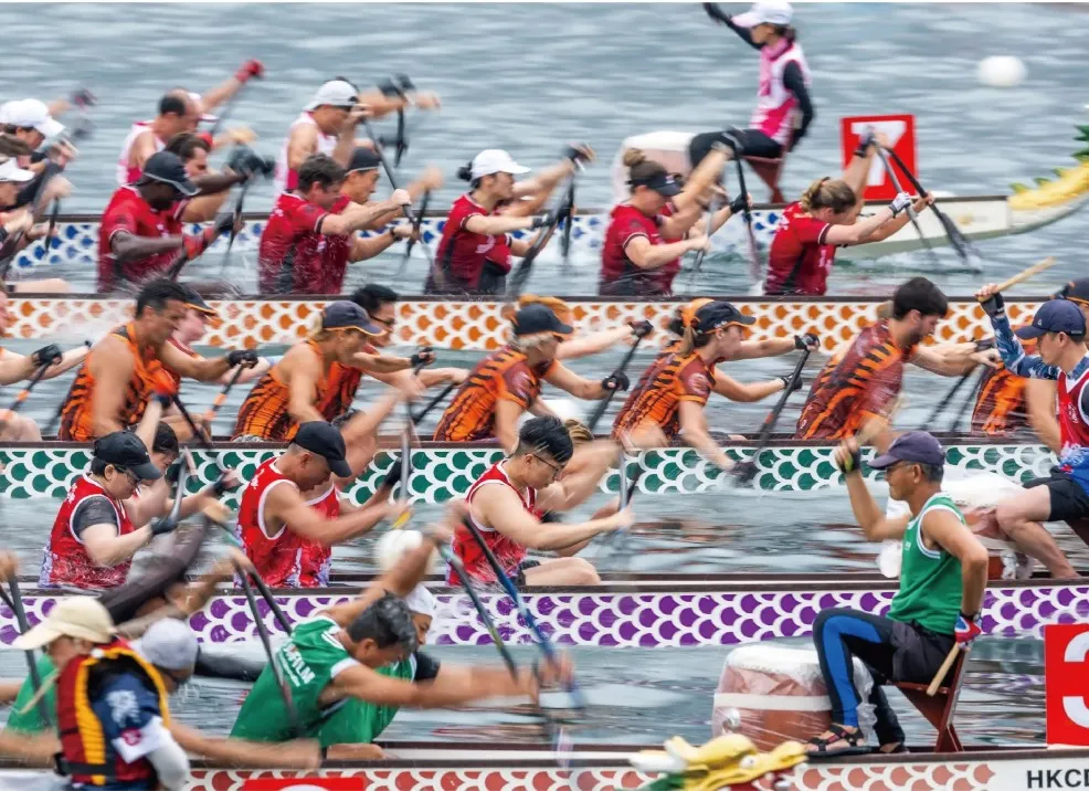 People racing at Dragon boat festival in Hong Kong