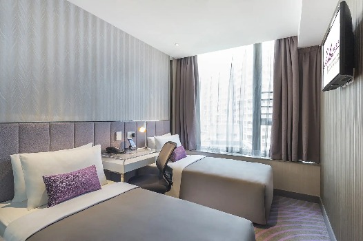 City-view twin bed with work desk at Silka Tseun Wan Deluxe Room