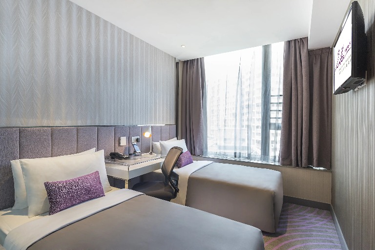 City-view twin bed with work desk at Silka Tseun Wan Deluxe Room