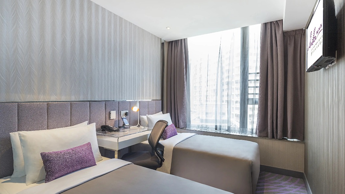 City-view twin bed with work desk at Silka Tseun Wan Deluxe Room